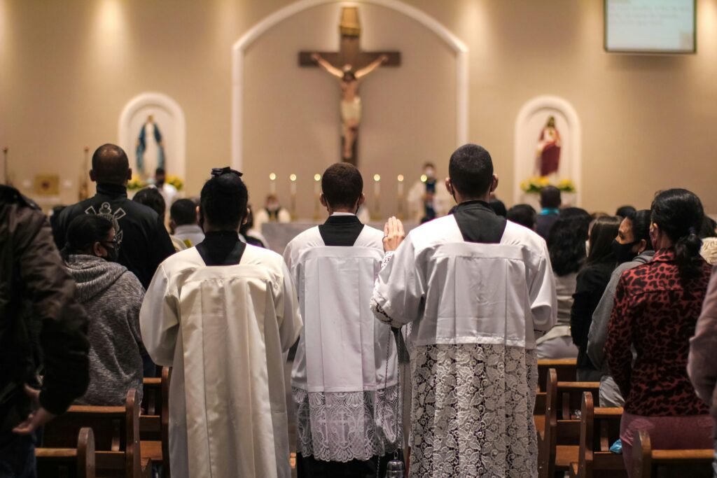 Back view of people attending a Mass in a church in Carapicuiba, Brazil.